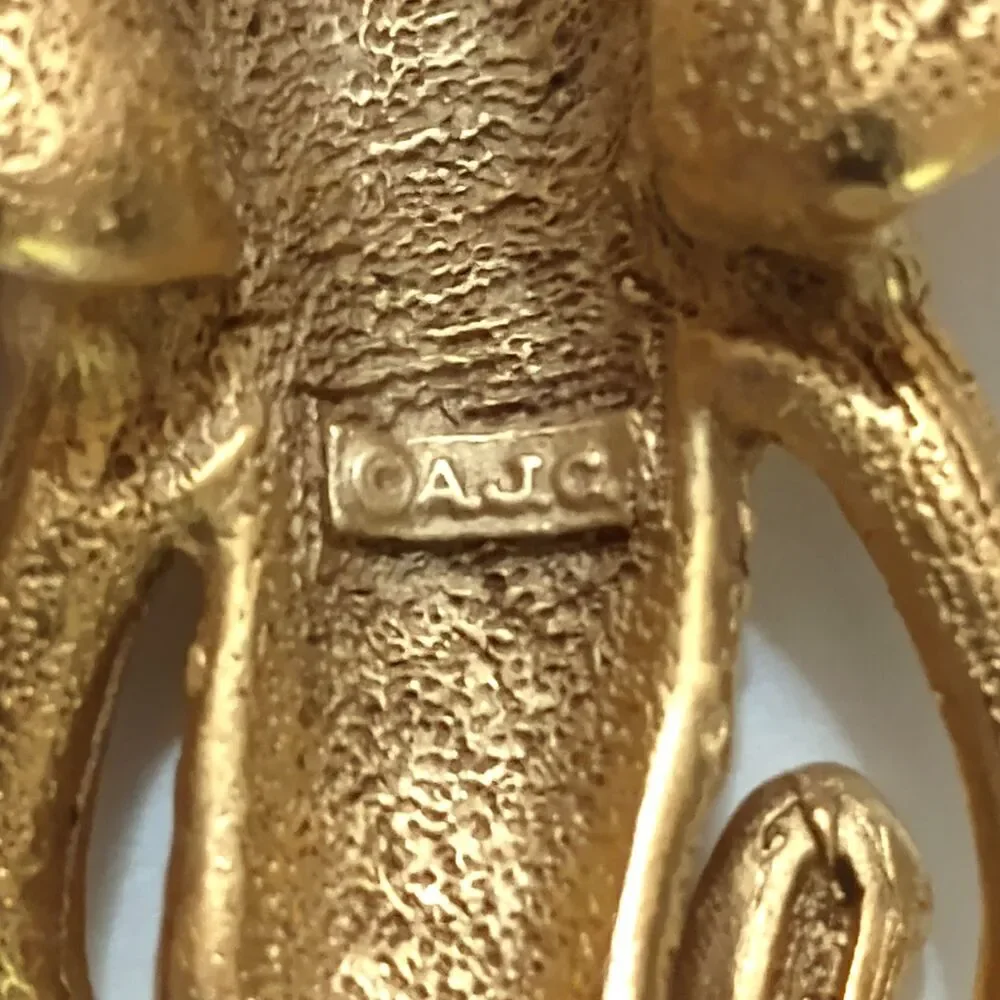 AJC Elephant Head Brooch Signed Gold Tone Faux Ivory Tusks Vintage Statement